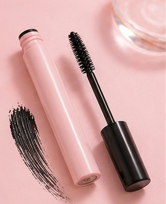 Tubing mascara brush for coating lashes with smudge-proof tube-forming formula