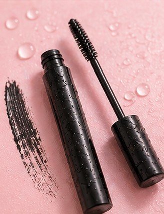 Waterproof mascara on pink background showing smudge-proof long-lasting formula